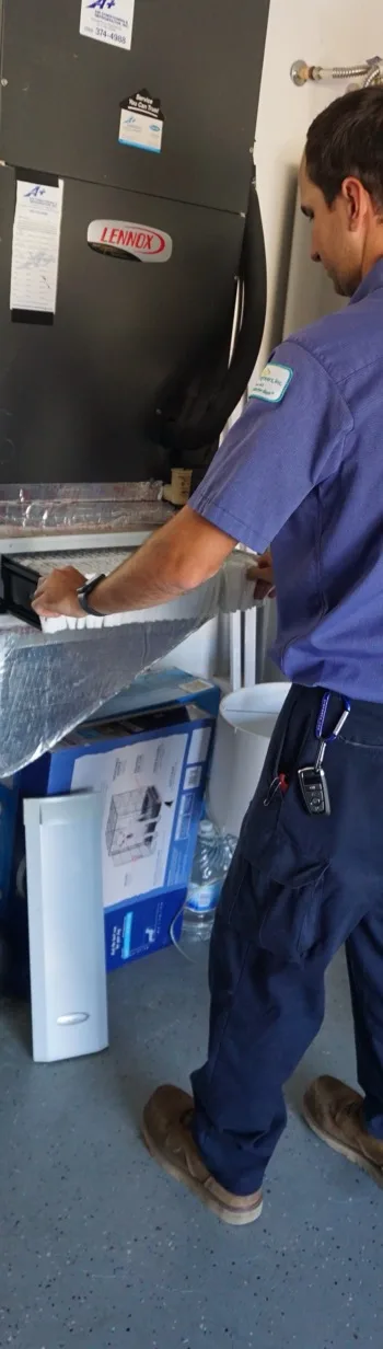 A+ Air Conditioning technician at work