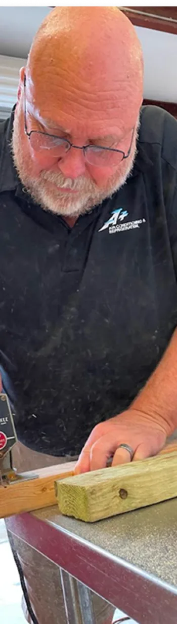 A+ Air Conditioning team member