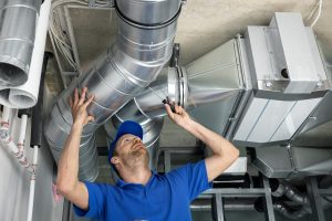 installer working on ductwork