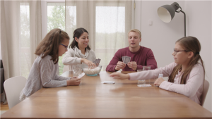family sitting at a table